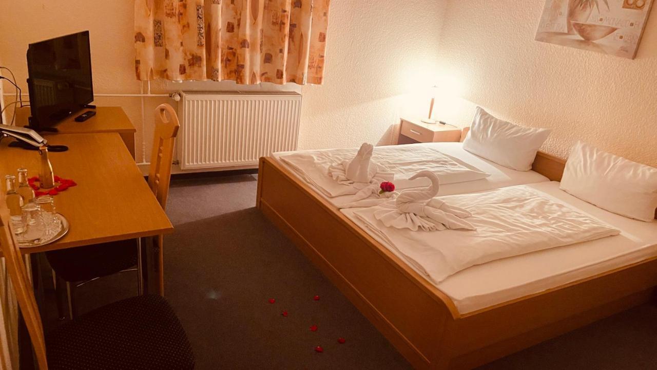 Hotel Merkur Garni Зарштедт Экстерьер фото